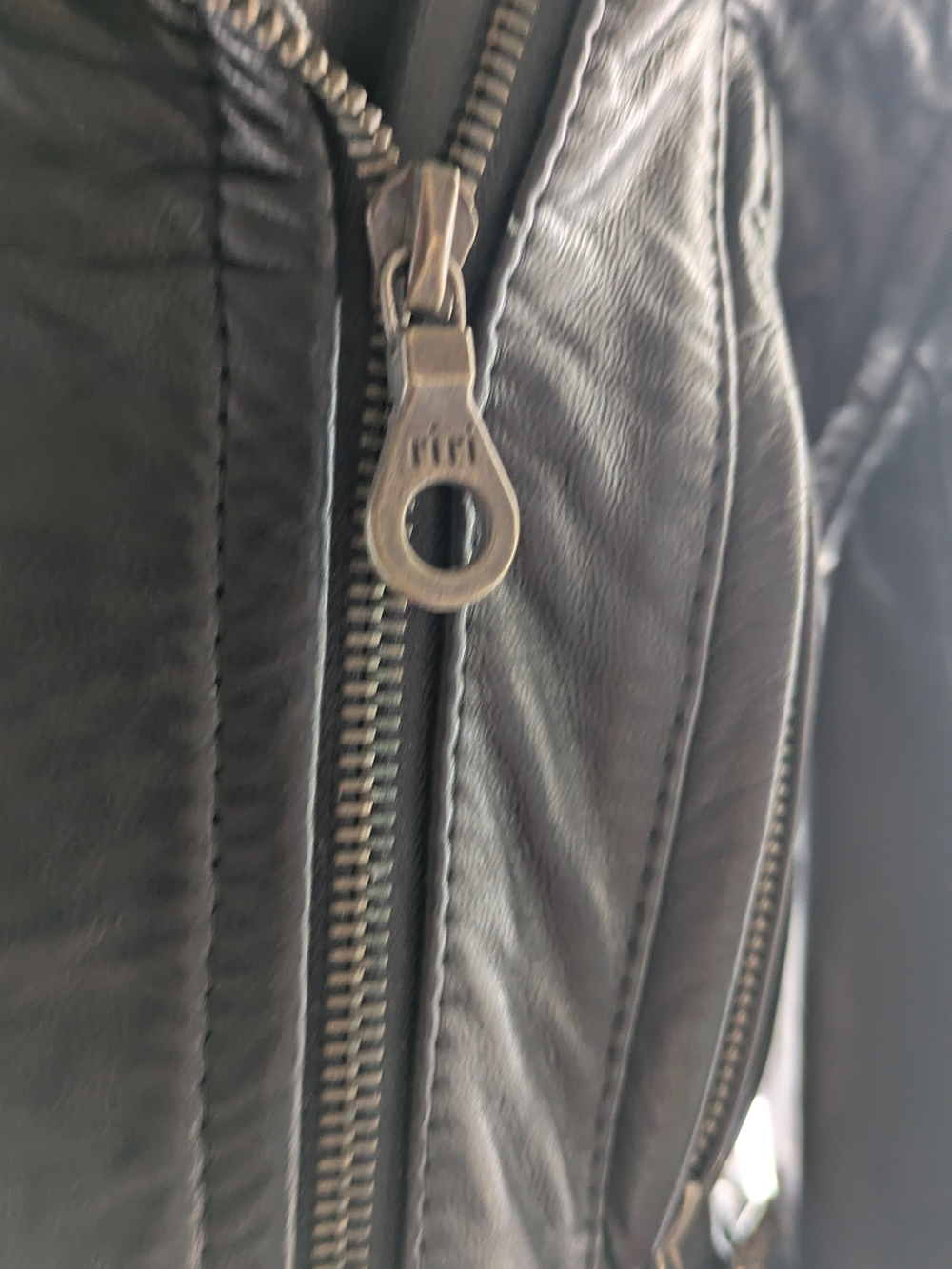 Moto Black Leather Jacket with Metal Zippera